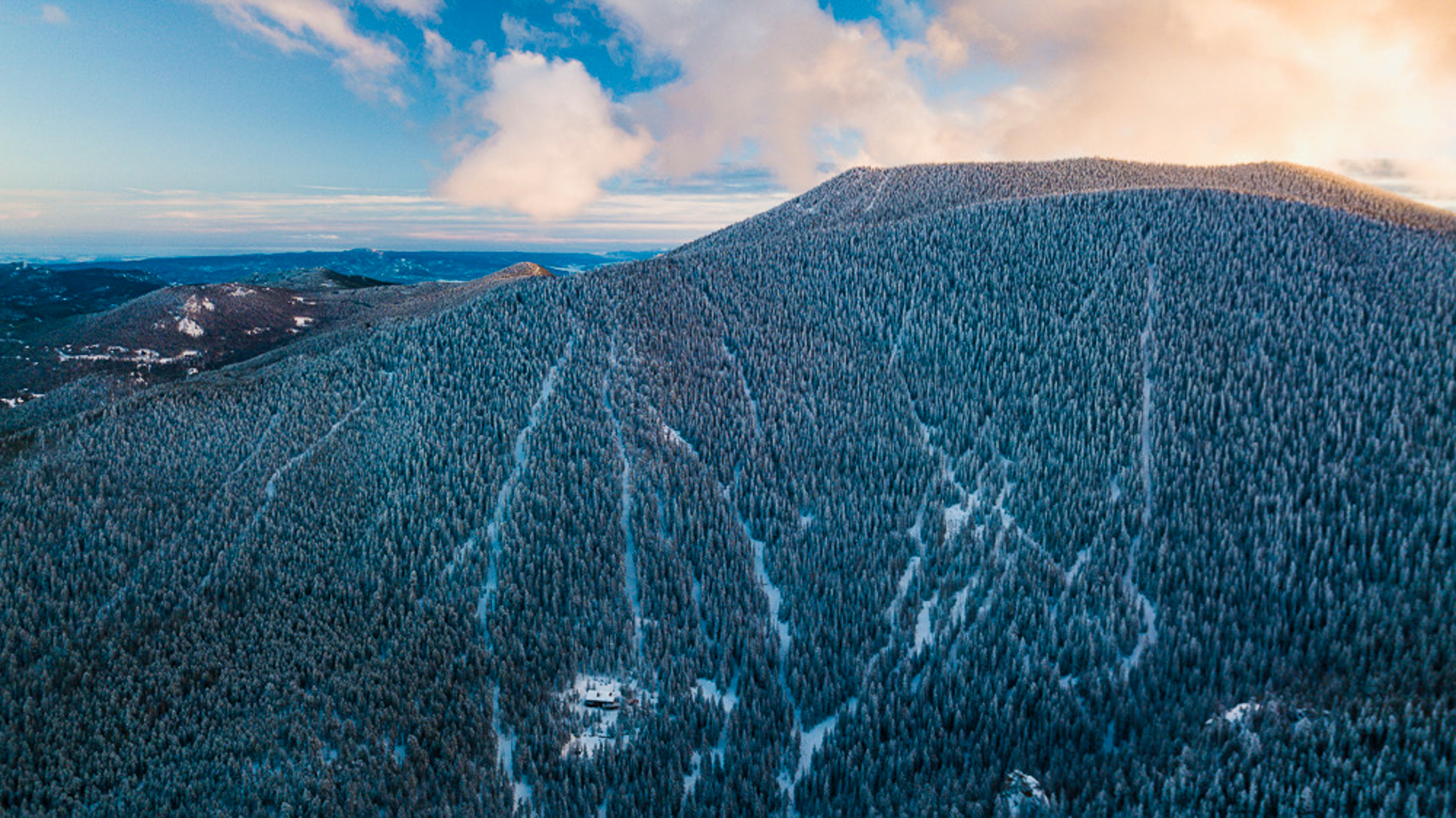 Aerial view of the mountain ridge in snow